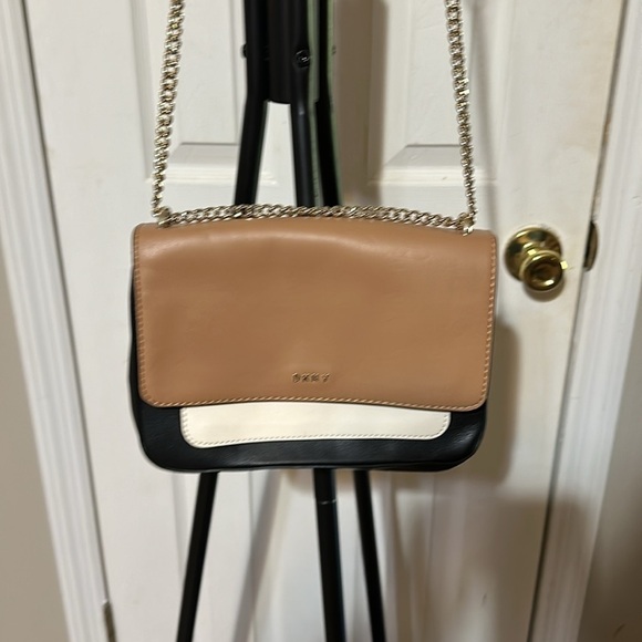 DKNY cross body purse preowned great condition. 10” wise by 7” length. - Picture 6 of 6